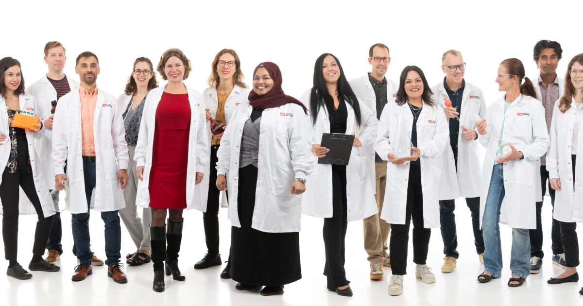 Team of CR in lab coats